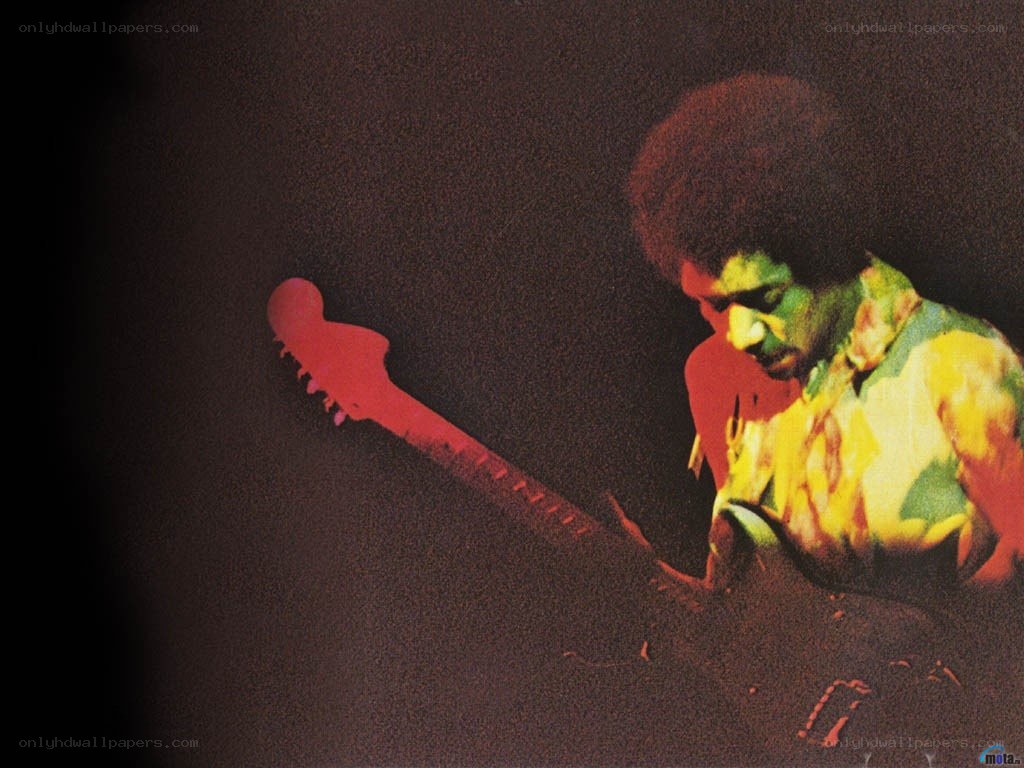 jimi hendrix playing guitar