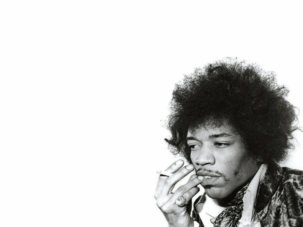 Jimi Hendrix smoking a cigarette