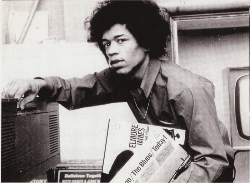 Jimi Hendrix with album