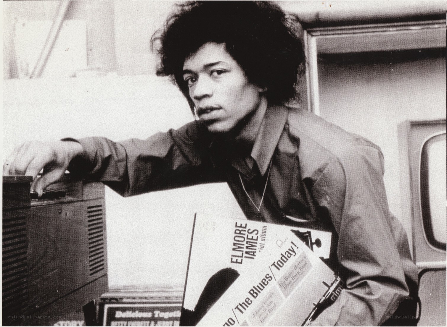 Jimi Hendrix with album