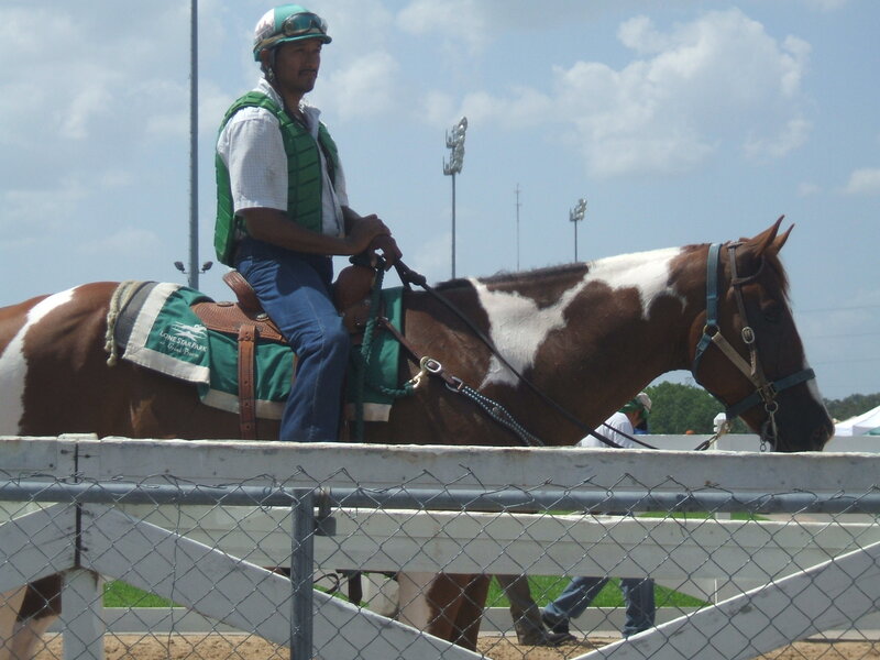 Jockey on a horse at the track