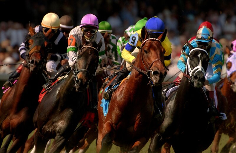 Jockeys Racing Horses