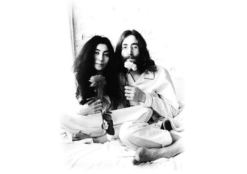 John and Yoko on a bed