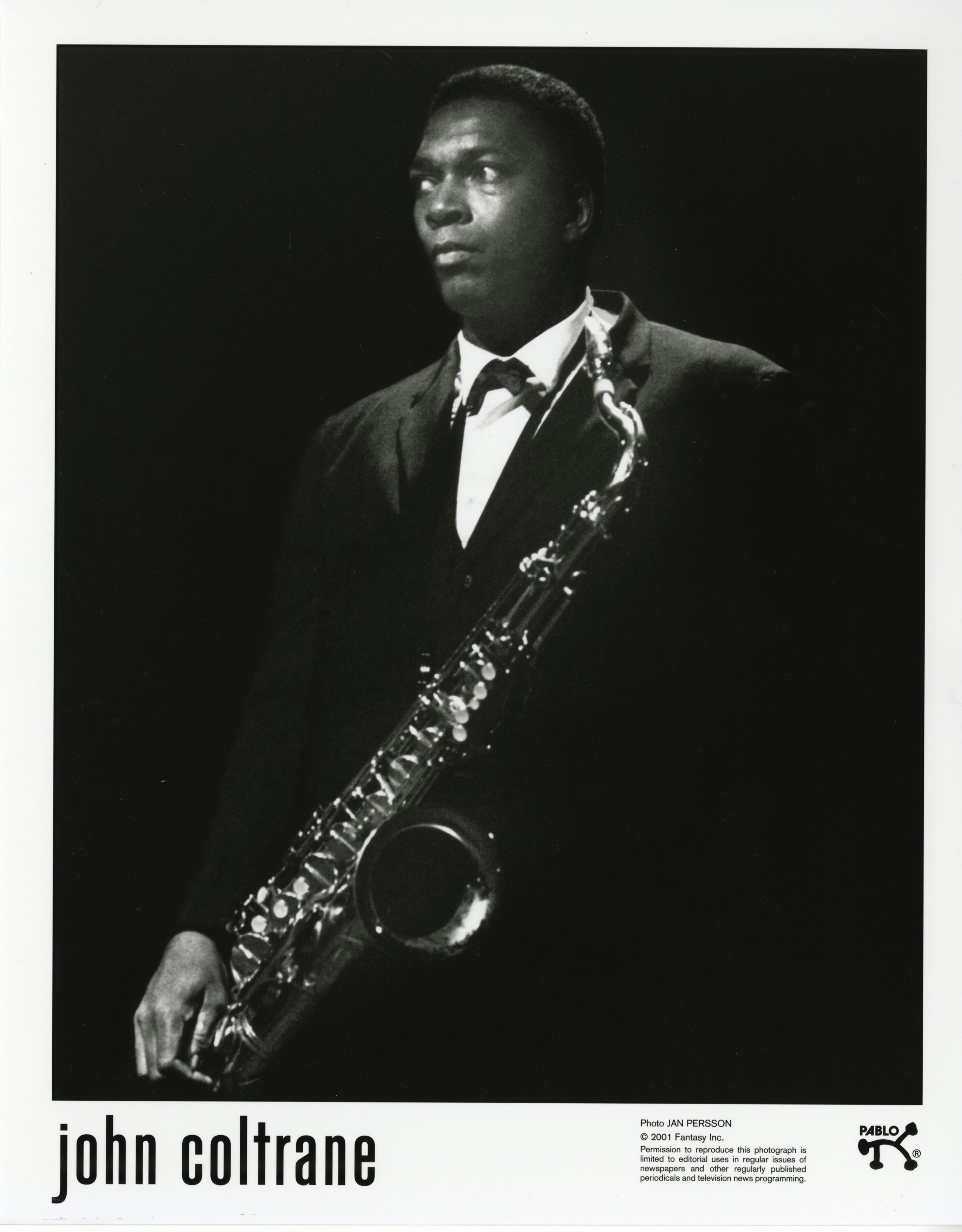 John Coltrane with saxophone