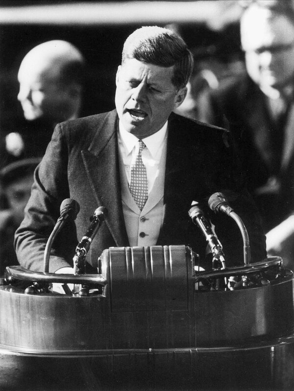 John F. Kennedy speaking at podium