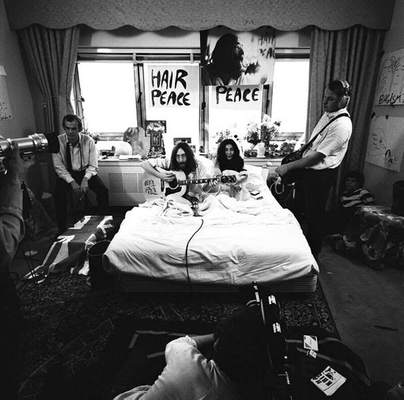 John Lennon on a Bed