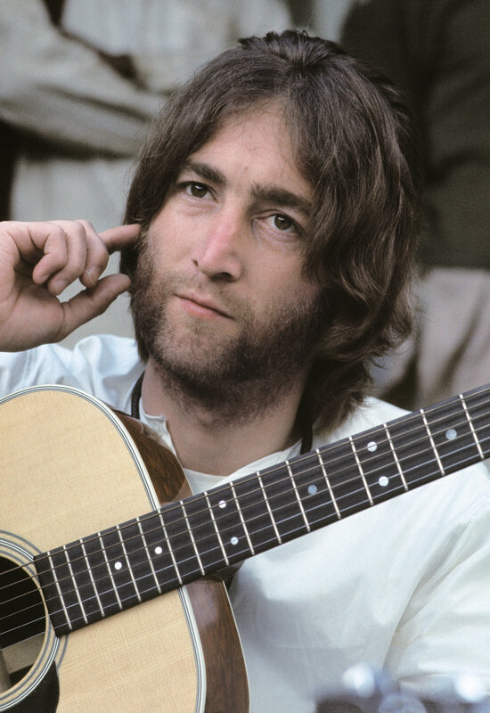 John Lennon with acoustic guitar