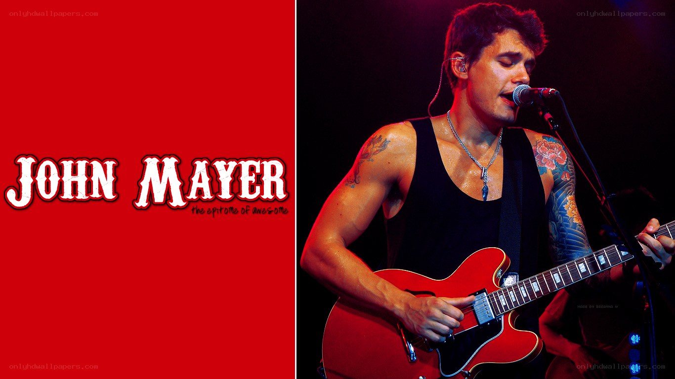 John Mayer performing on stage