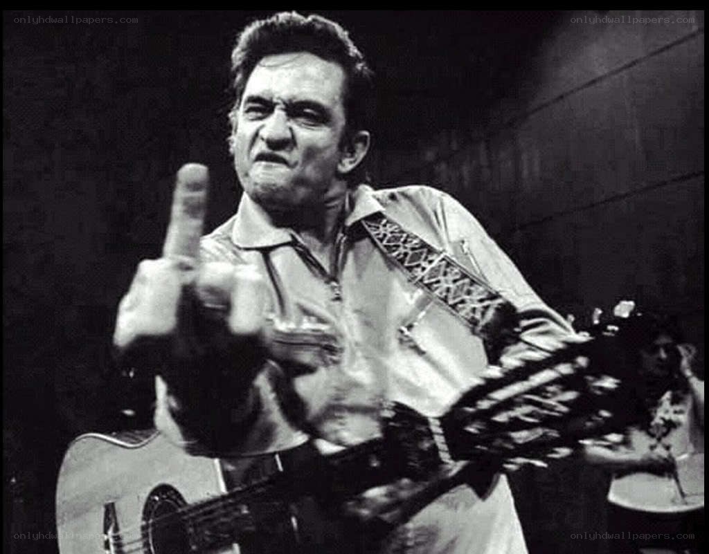 Johnny Cash performing on stage