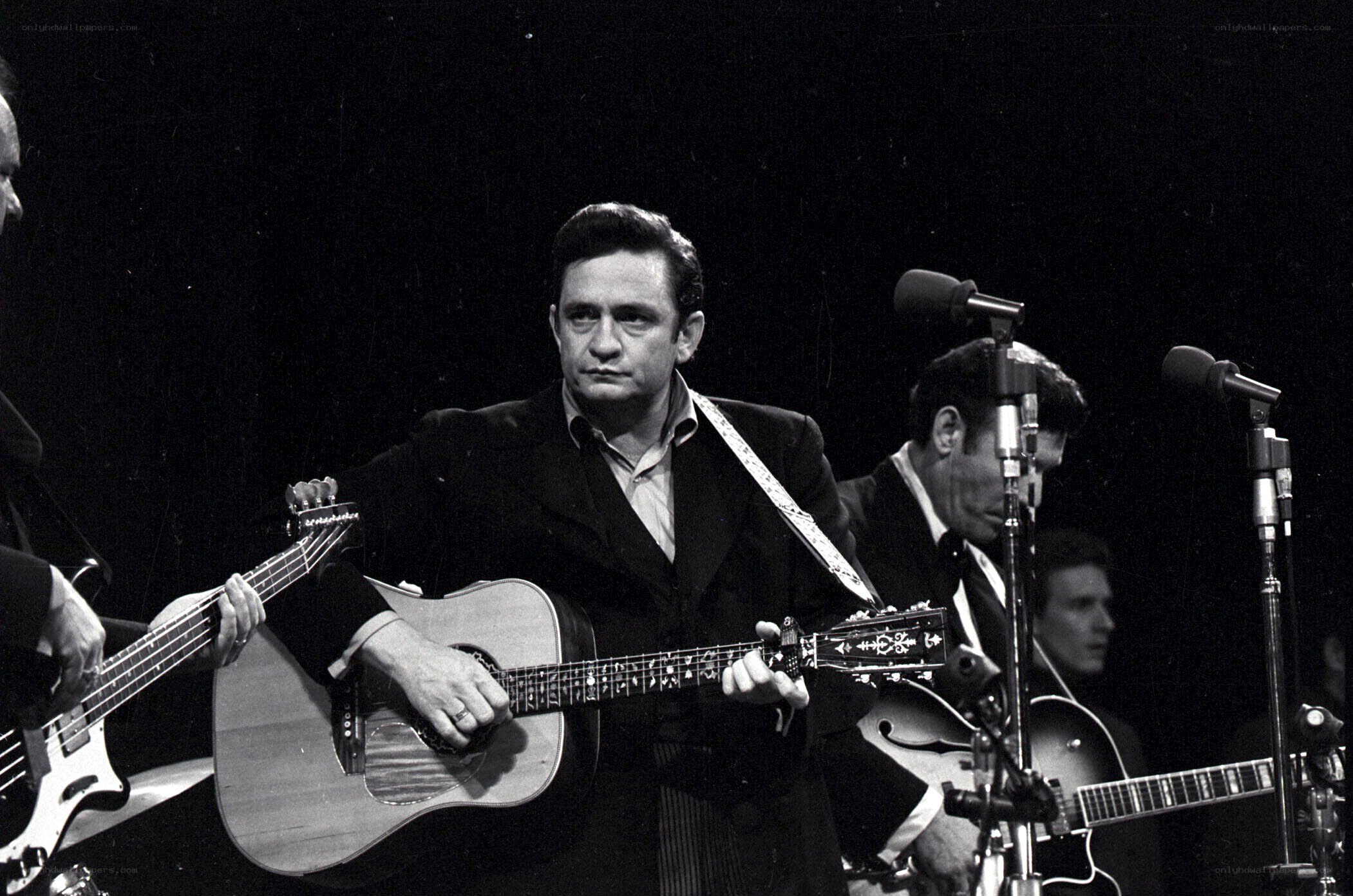 Johnny Cash performing on stage