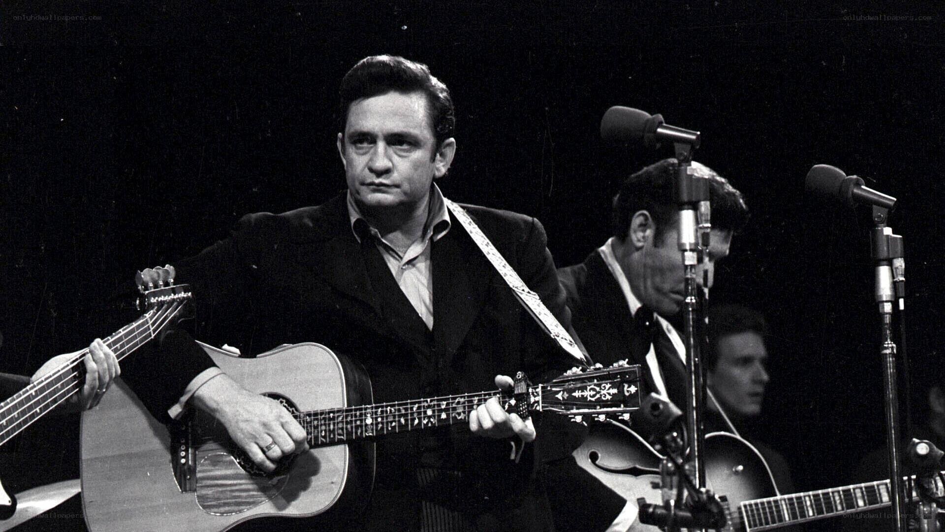 Johnny Cash performing on stage