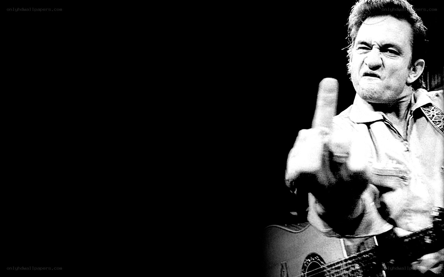 Johnny Cash performing on stage
