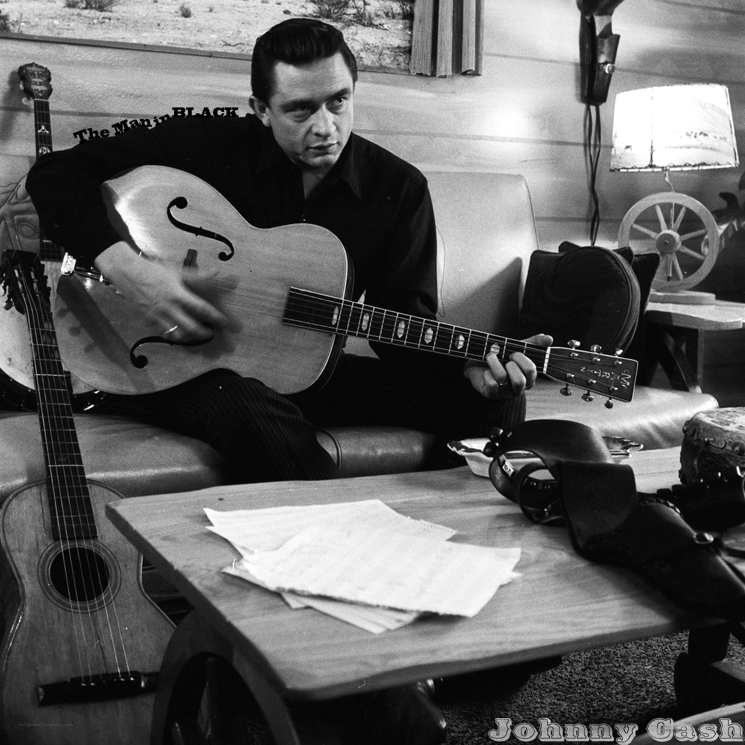 Johnny Cash playing guitar