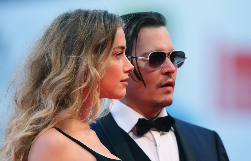 Johnny Depp and Amber Heard at event