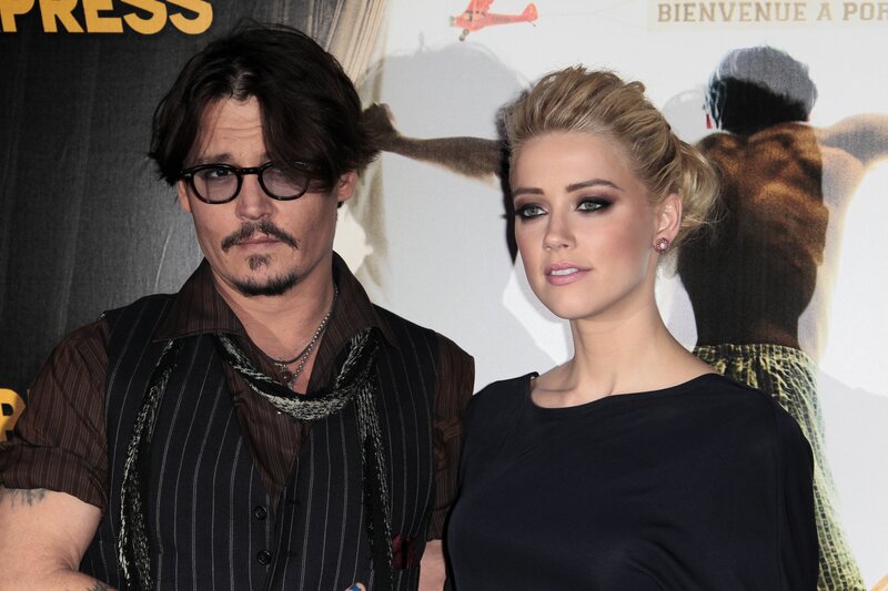 Johnny Depp and Amber Heard at event