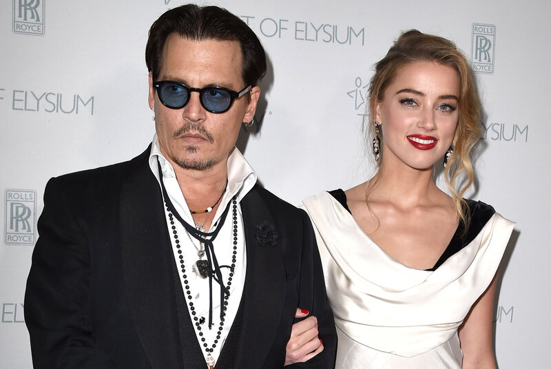Johnny Depp and Amber Heard at event
