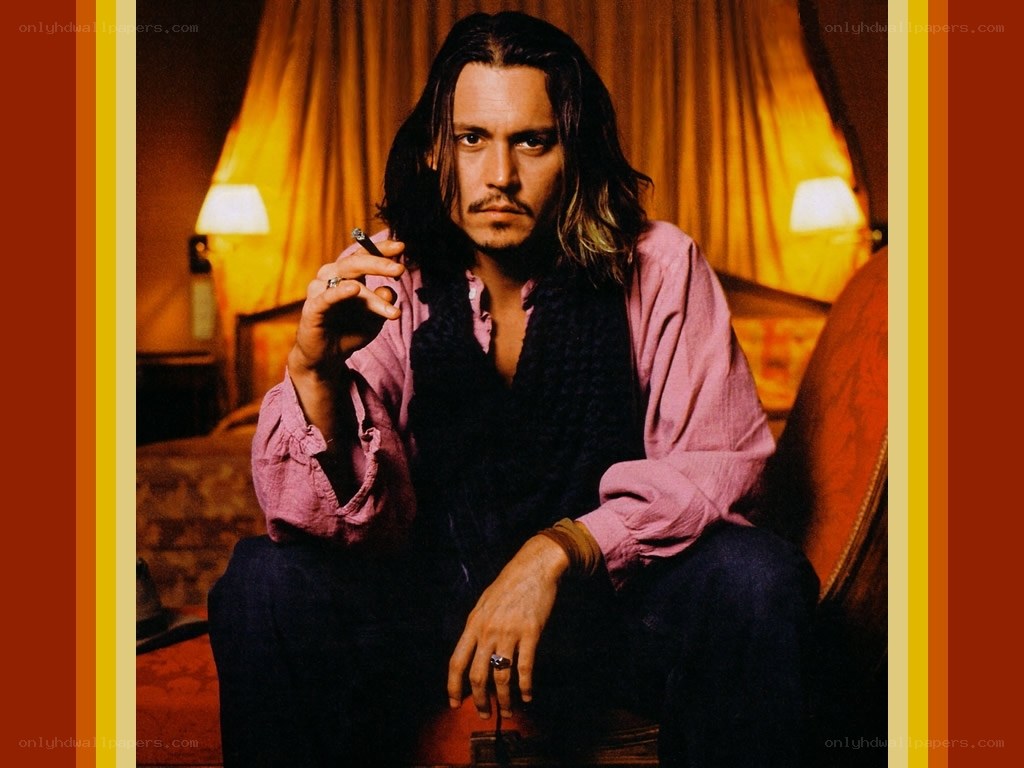 Johnny Depp holding a cigarette