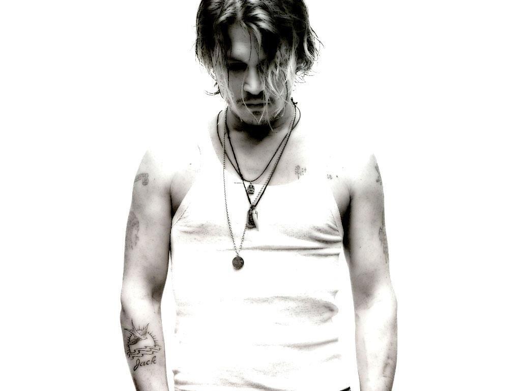 Johnny Depp in a white tank top