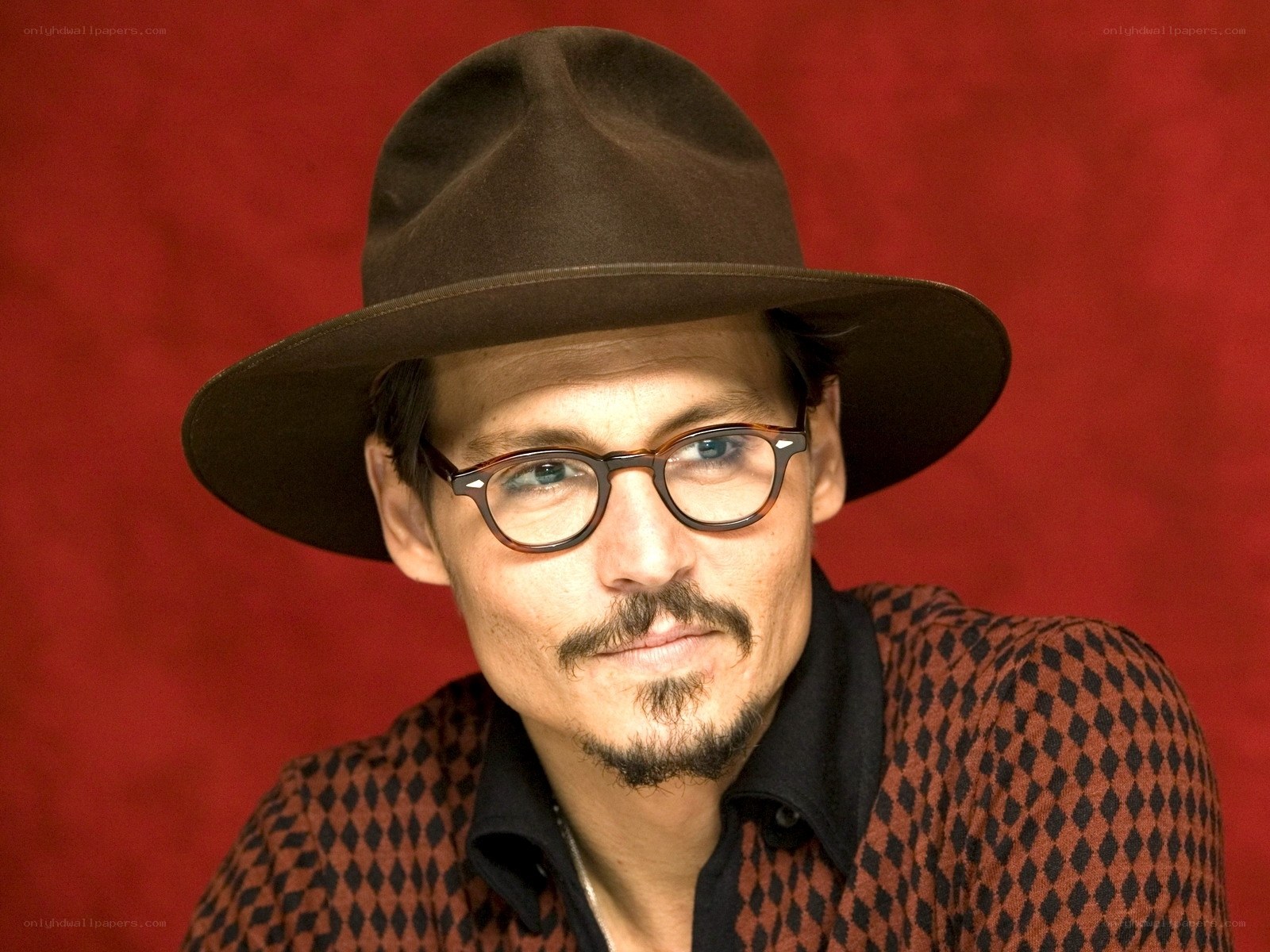 Johnny Depp in hat and glasses