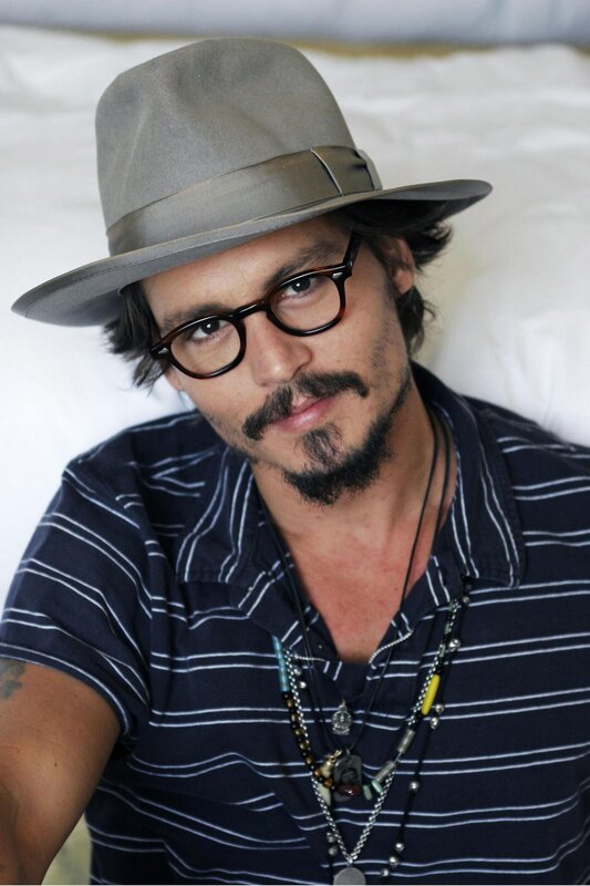 Johnny Depp in hat and glasses