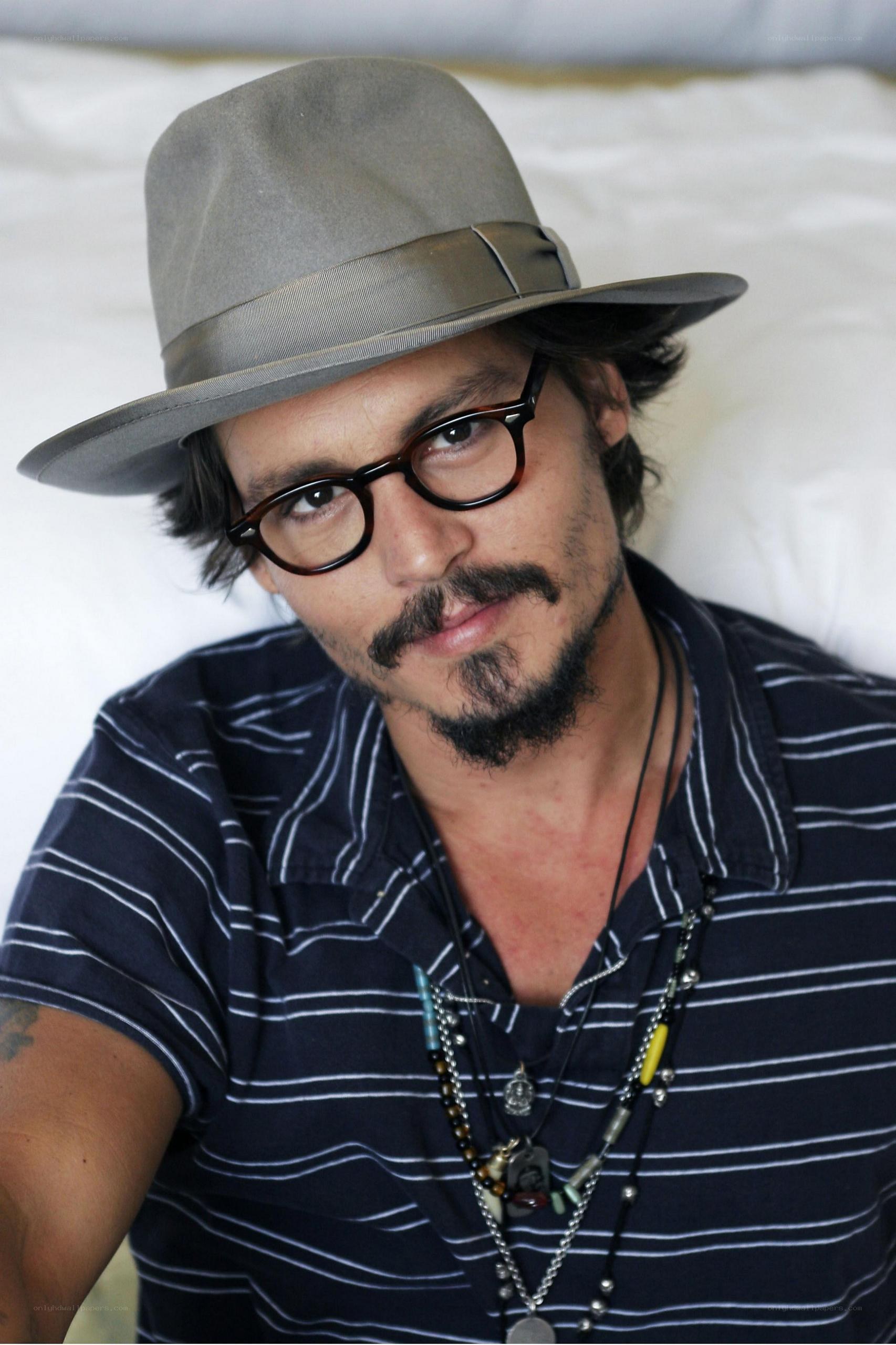 Johnny Depp in hat and glasses