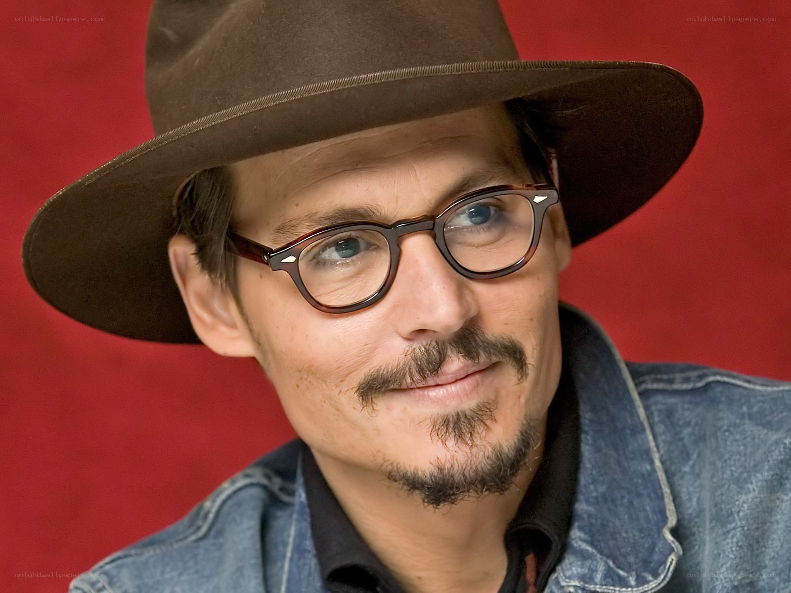 Johnny Depp in hat and glasses