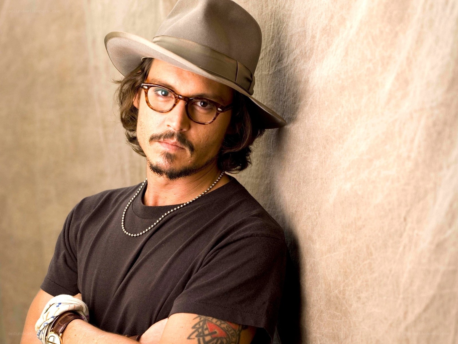 Johnny Depp in hat and glasses
