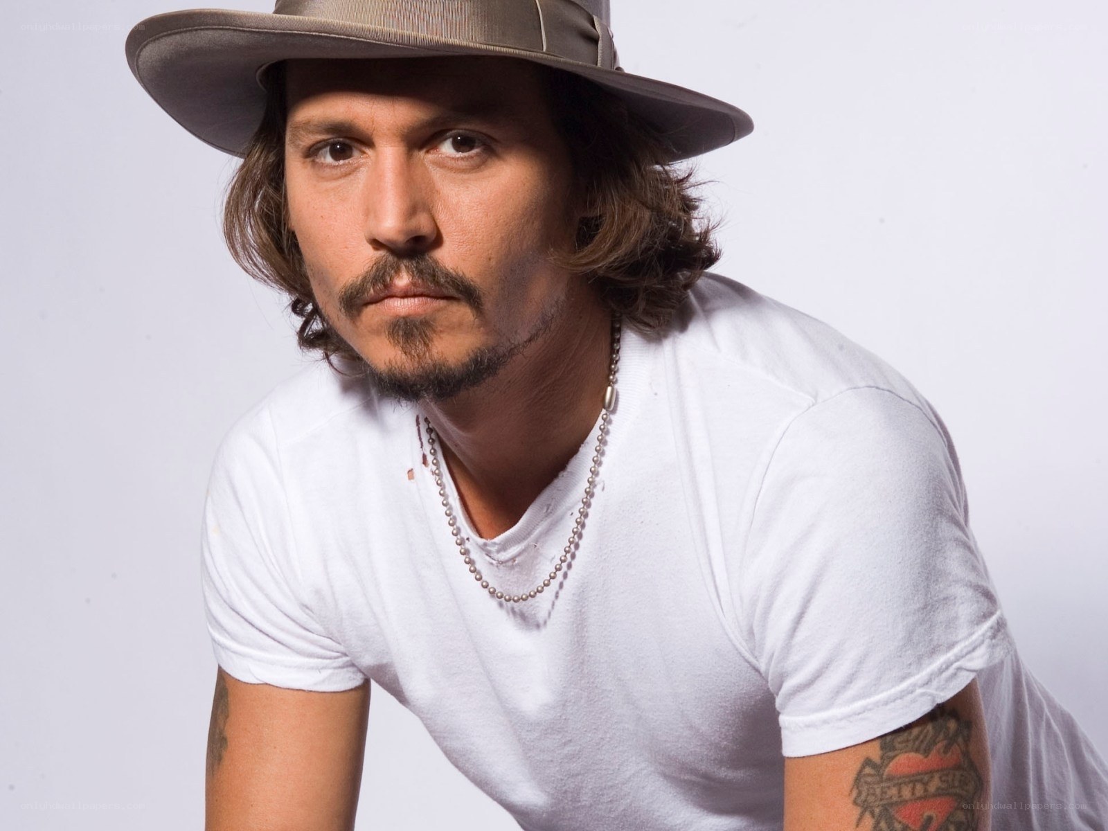 Johnny Depp in hat and white t-shirt