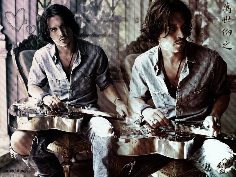 Johnny Depp playing guitar