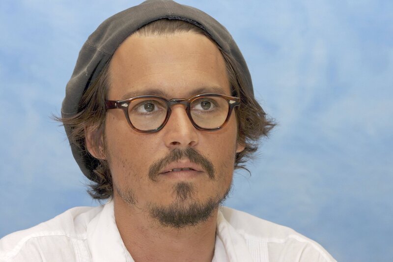 Johnny Depp wearing glasses