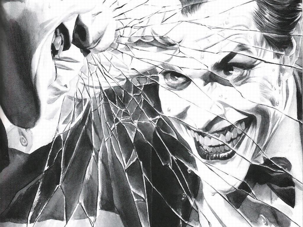 Joker behind shattered glass