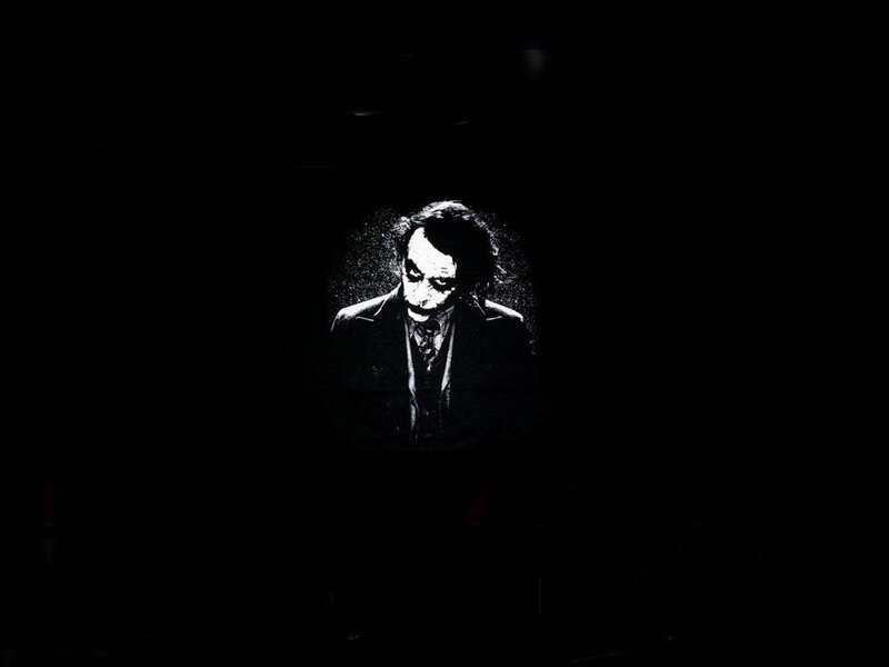 Joker character in dark room