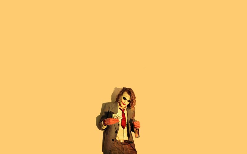 Joker character with bottle and money