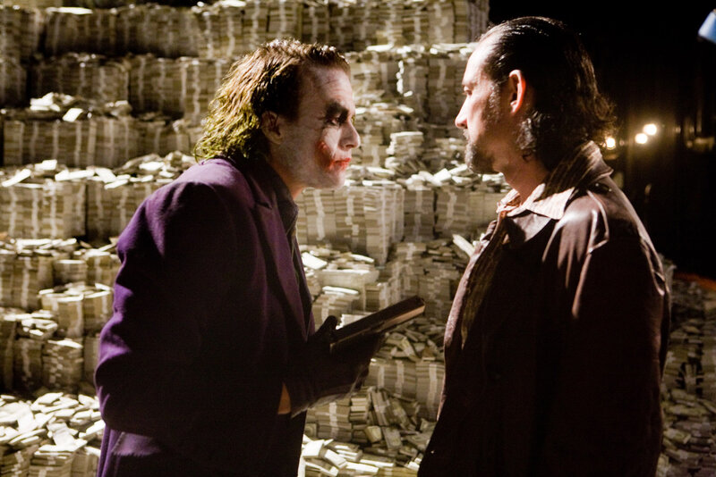 Joker confronts man in money room