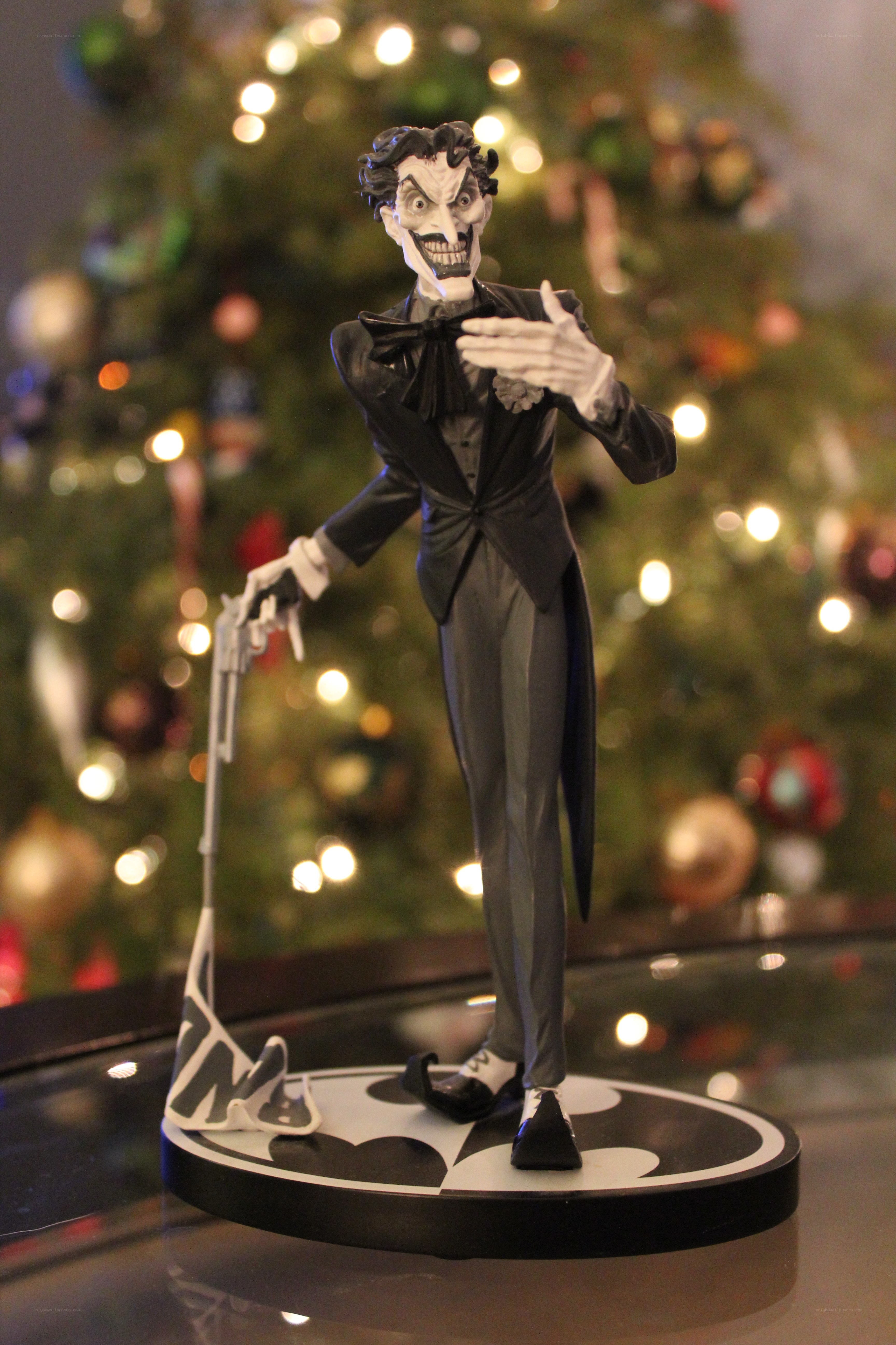 Joker figurine on Batman base