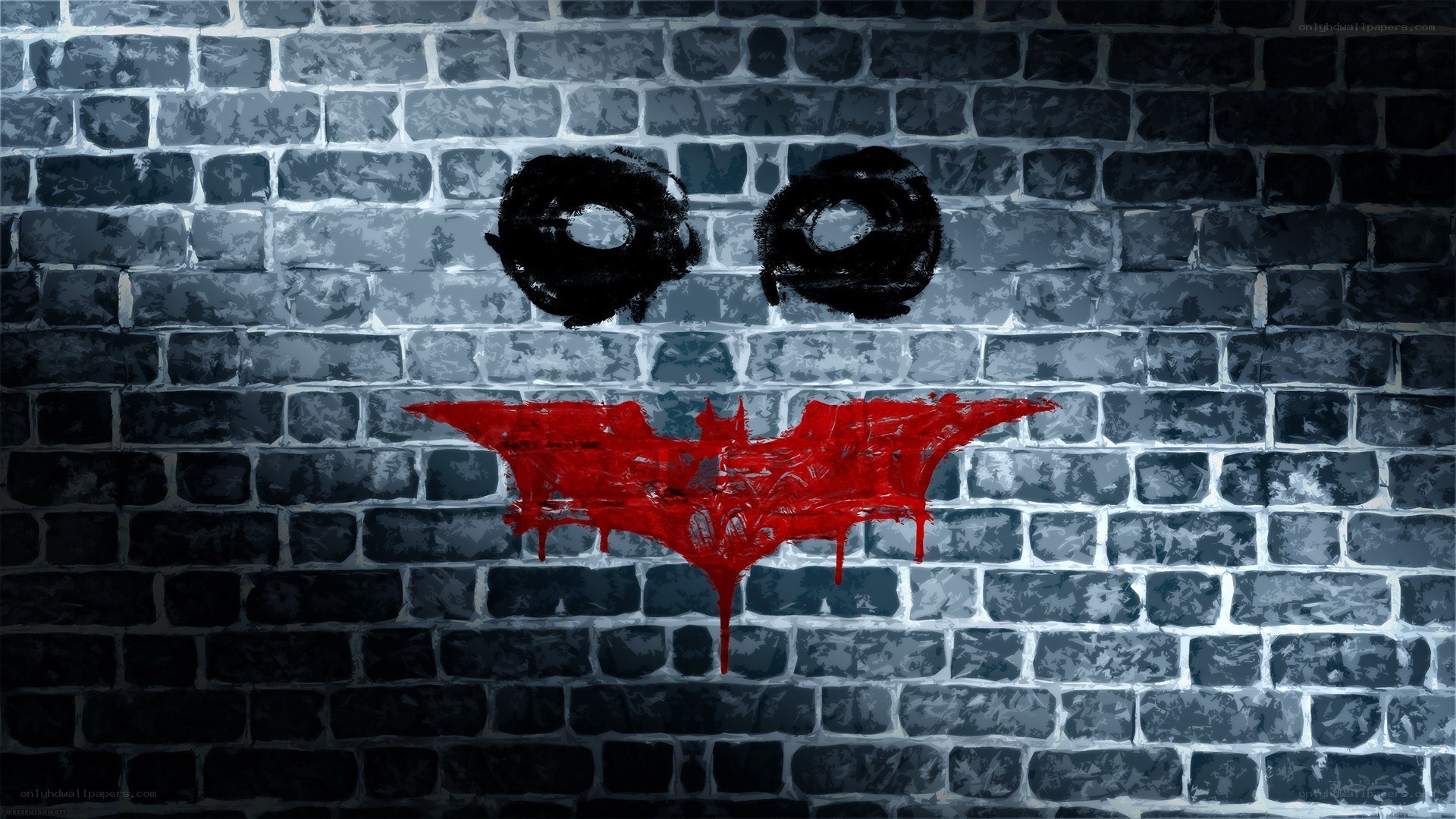 Joker graffiti on brick wall