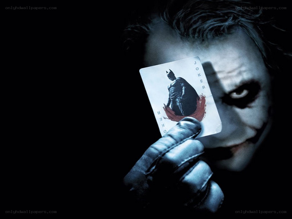 Joker holding a card