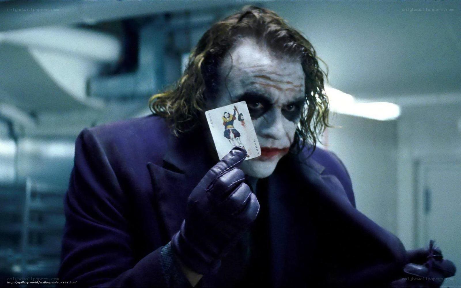 Joker holding a card