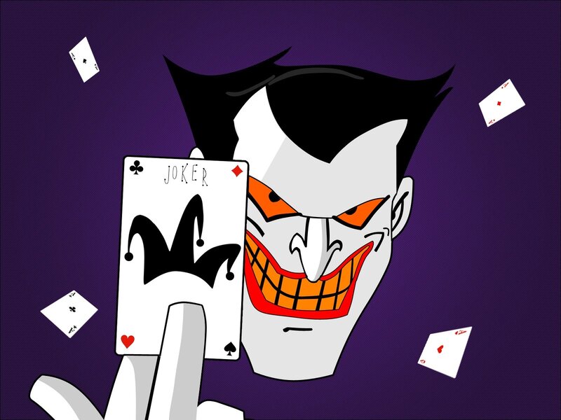 Joker holding a joker card