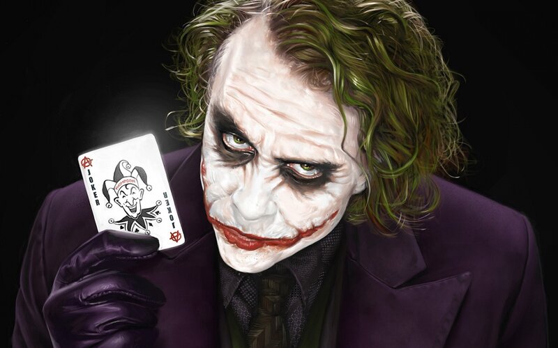 Joker holding a joker card