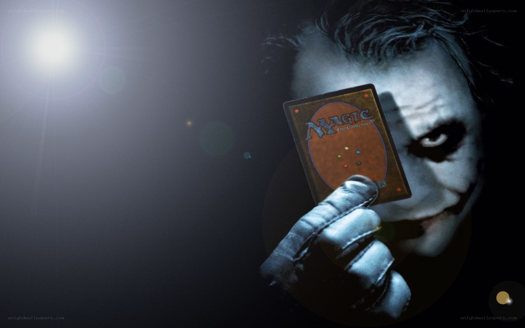 Joker holding a magic card