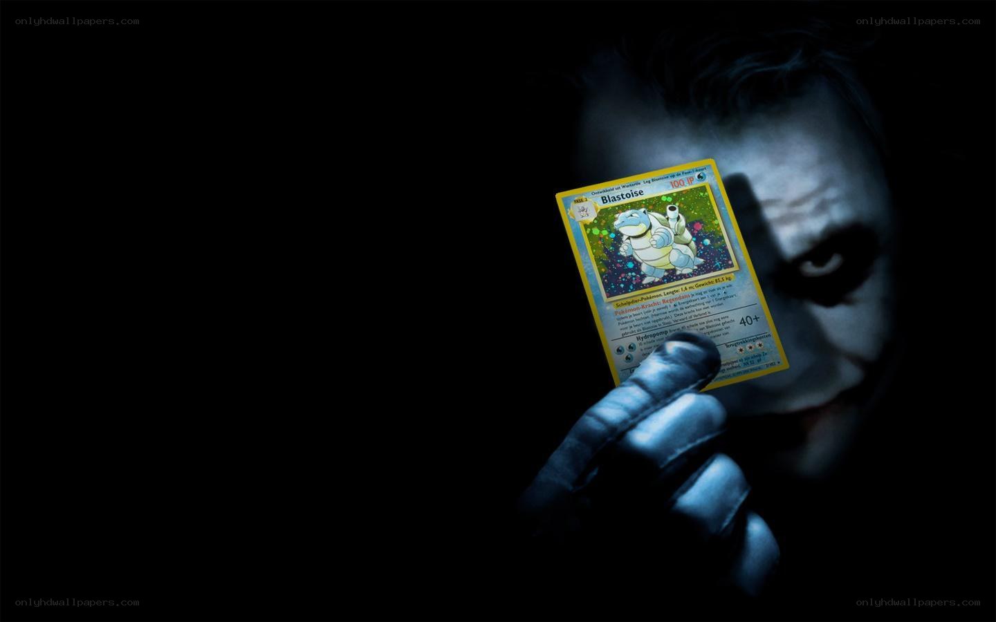 Joker holding Blastoise card