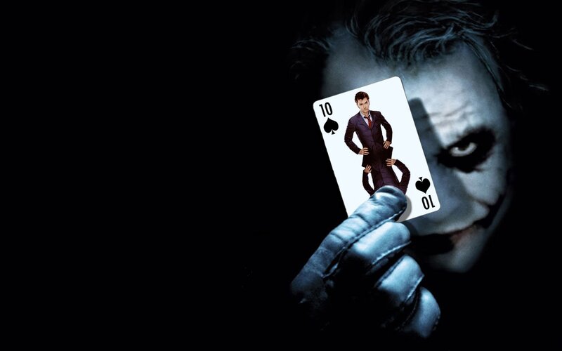 Joker Holding Card — Black, Dark, Night, Photograph, Playing Card