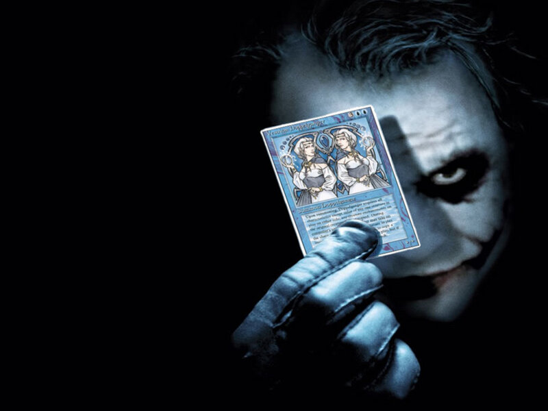 Joker Holding Card — Black, Dramatic, Night, Photograph, Gloves