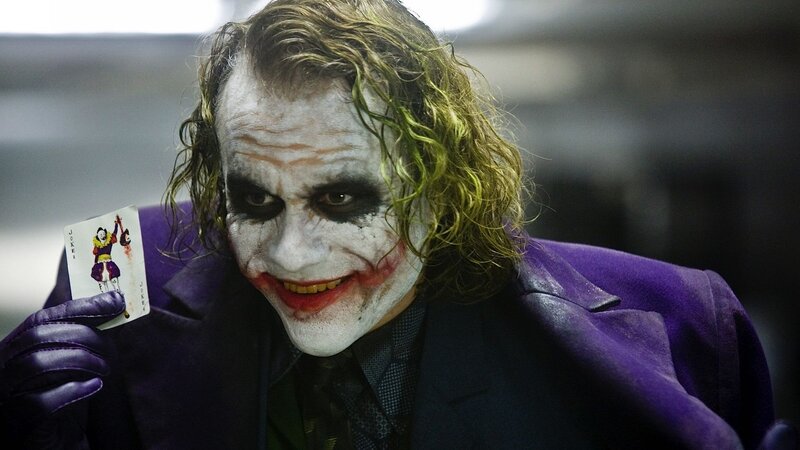 Joker Holding Card — Purple, Dramatic, Photograph, Purple Coat, Gloves