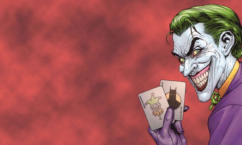 Joker holding cards