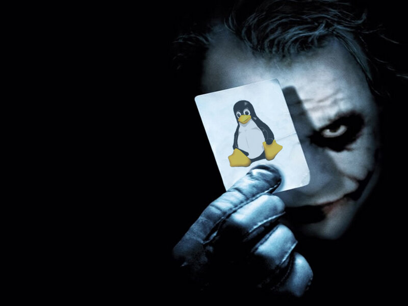 Joker holding Linux card