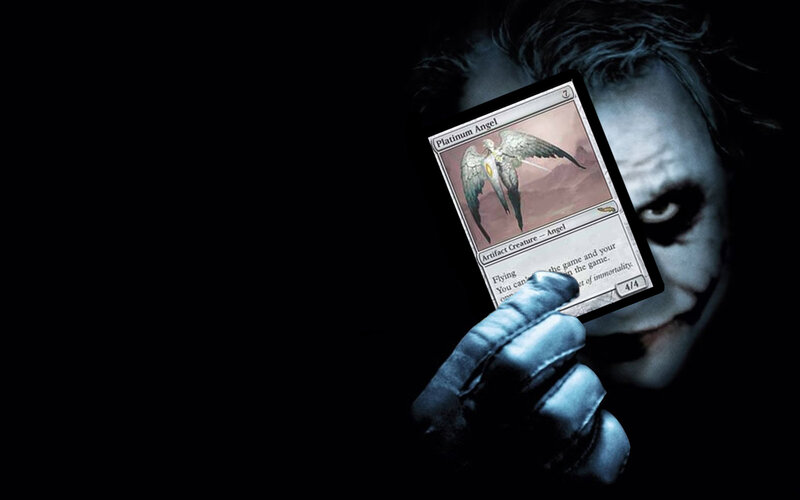 Joker holding magic card