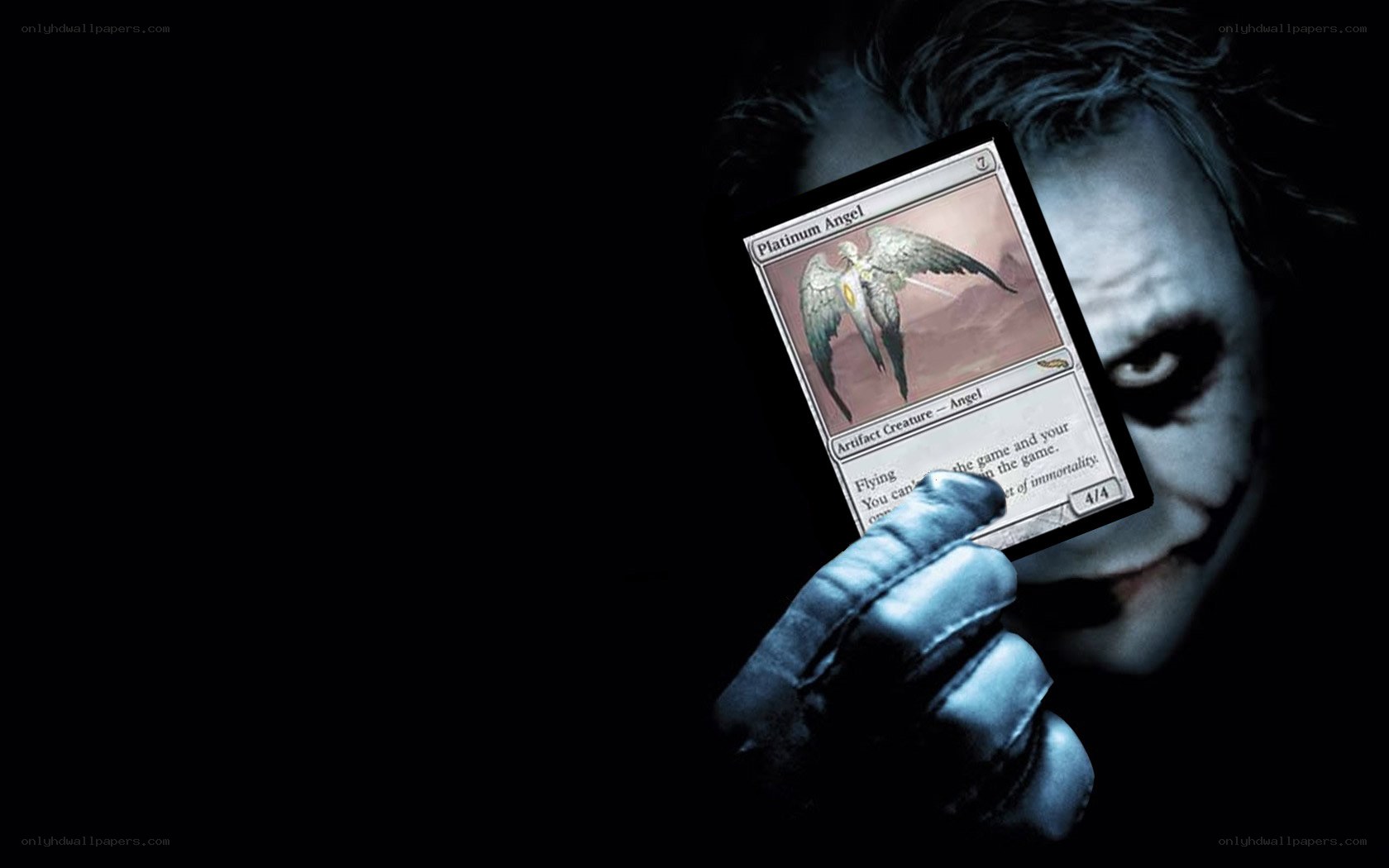 Joker holding magic card