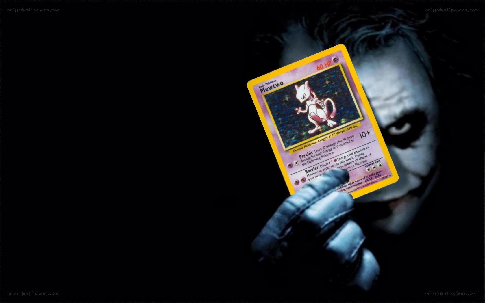 Joker holding Mewtwo card